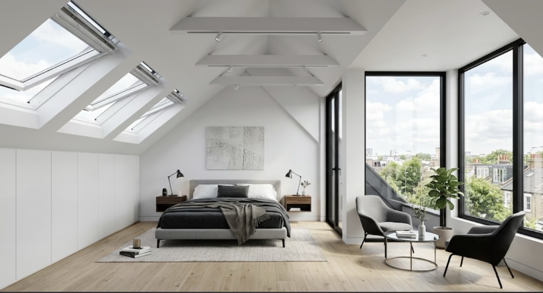 Loft bedroom with rooflights and corner glazing over the rooftops